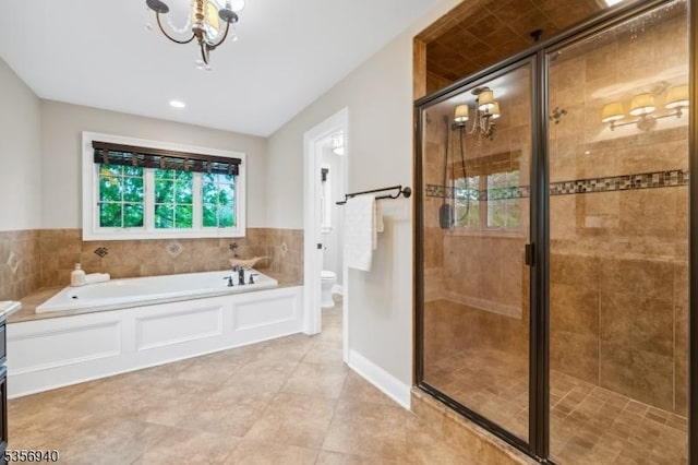 28 Handler Ct, Montgomery Twp, NJ 08502 - bathroom with a stall shower, a chandelier, a garden tub, toilet, and tile patterned flooring