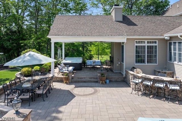 28 Handler Ct, Montgomery Twp, NJ 08502 - view of patio featuring a hot tub, outdoor dining area, and area for grilling