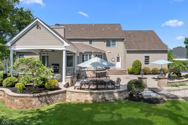 28 Handler Ct, Montgomery Twp, NJ 08502 - rear view of house with a patio area, a ceiling fan, a yard, and a shingled roof