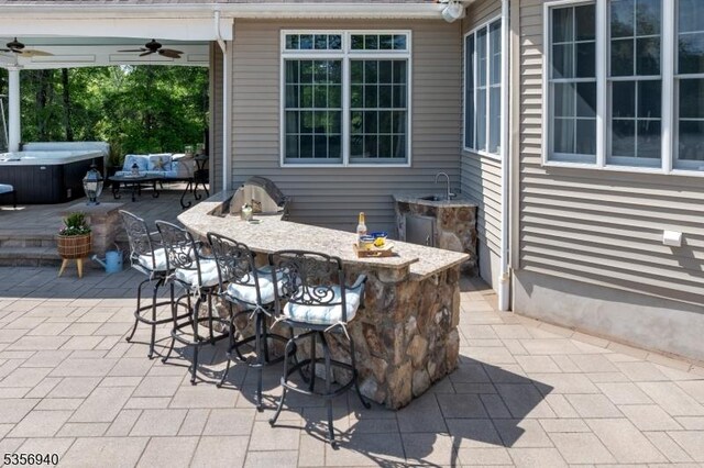 28 Handler Ct, Montgomery Twp, NJ 08502 - view of patio / terrace featuring a hot tub and a ceiling fan