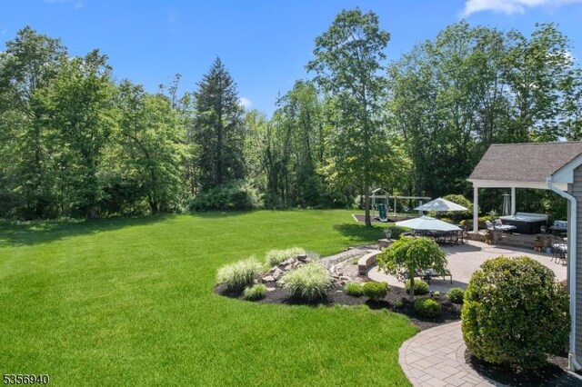 28 Handler Ct, Montgomery Twp, NJ 08502 - view of grassy yard featuring a patio area and a gazebo