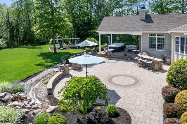 28 Handler Ct, Montgomery Twp, NJ 08502 - view of patio with a hot tub