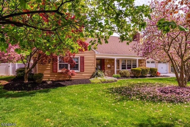 3 Larsen Rd, Franklin Twp, NJ 08873 - view of front of home featuring stone siding, a chimney, a garage, and driveway