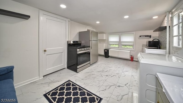 29 Oldham Rd, Wayne Twp, NJ 07470 - kitchen with stainless steel appliances, light marble finish flooring, radiator, recessed lighting, and baseboards