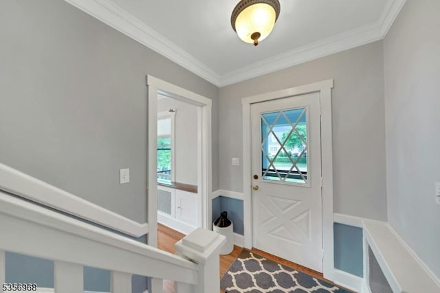 42 Mountain Ave, Mendham Boro, NJ 07945 - foyer with healthy amount of natural light, ornamental molding, and wood finished floors