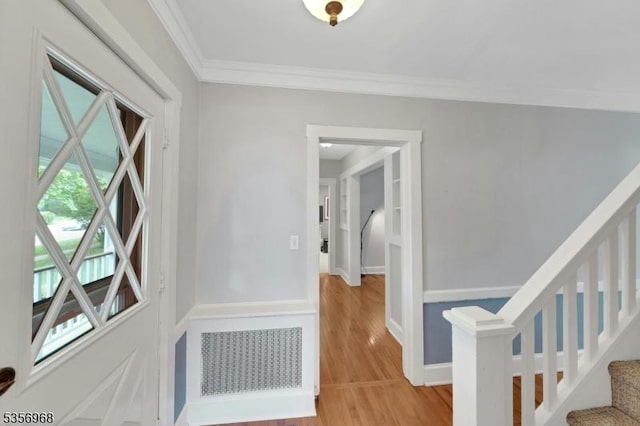42 Mountain Ave, Mendham Boro, NJ 07945 - hallway featuring crown molding, light wood finished floors, stairs, and baseboards