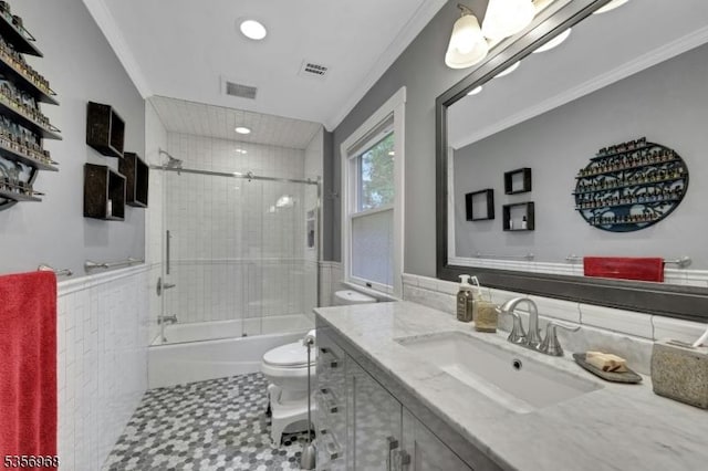 42 Mountain Ave, Mendham Boro, NJ 07945 - full bath featuring crown molding, toilet, vanity, tile patterned floors, and enclosed tub / shower combo