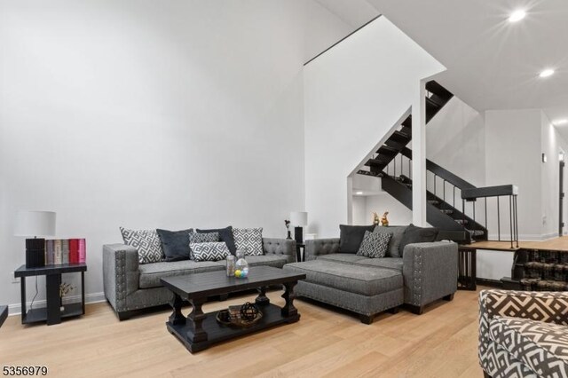 21 Stepping Rdg, North Caldwell Boro, NJ 07006 - living area featuring wood finished floors, stairs, recessed lighting, and baseboards
