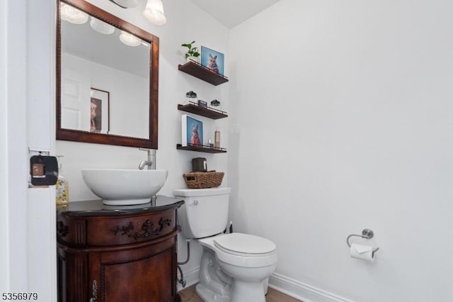 21 Stepping Rdg, North Caldwell Boro, NJ 07006 - bathroom with toilet, baseboards, and vanity