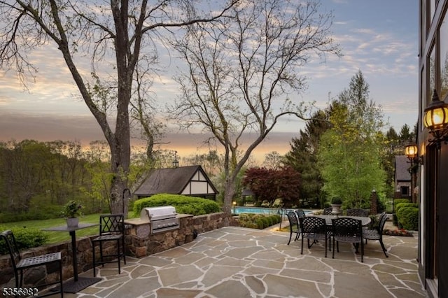 11 Kerby Ln, Mendham Boro, NJ 07945 - view of patio with exterior kitchen, a grill, an outdoor pool, and outdoor dining area