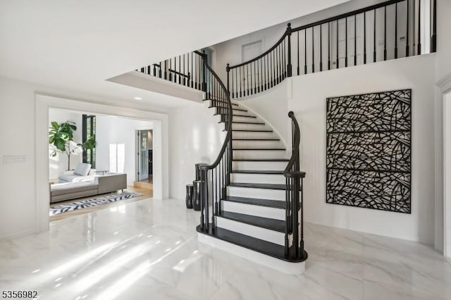 11 Kerby Ln, Mendham Boro, NJ 07945 - stairway featuring marble tiled flooring and a high ceiling