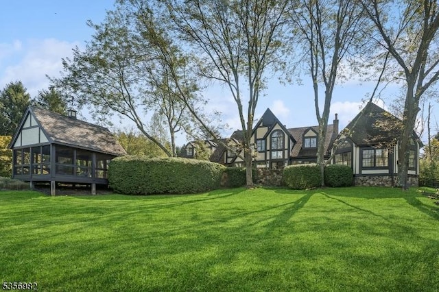 11 Kerby Ln, Mendham Boro, NJ 07945 - view of grassy yard with a sunroom