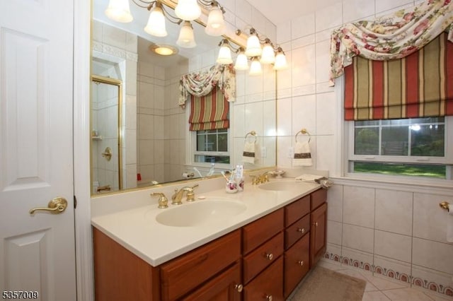 45 Linwood Ave, Dover Town, NJ 07801 - full bath with tile walls, double vanity, an enclosed shower, and tile patterned flooring
