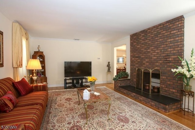 45 Linwood Ave, Dover Town, NJ 07801 - living area featuring wood finished floors, a fireplace, ornamental molding, and baseboards