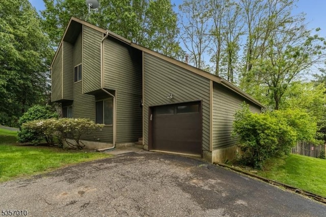 60 Dewey Ave, High Bridge Boro, NJ 08829 - view of home's exterior with asphalt driveway and a garage