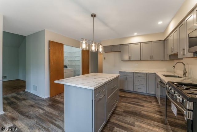 60 Dewey Ave, High Bridge Boro, NJ 08829 - kitchen with gray cabinets, dark wood-style floors, stainless steel gas range oven, a sink, and recessed lighting