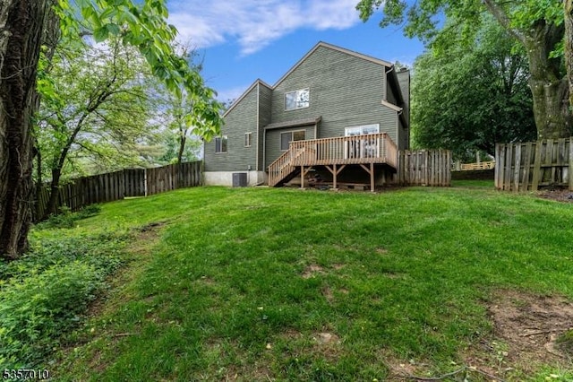 60 Dewey Ave, High Bridge Boro, NJ 08829 - rear view of house with a wooden deck, stairs, and central AC