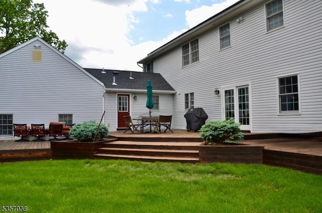 16 Dorset Ln, Andover Twp, NJ 07848 - rear view of house featuring outdoor dining area, a yard, and a wooden deck