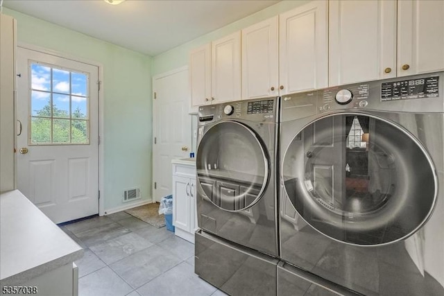 16 Dorset Ln, Andover Twp, NJ 07848 - laundry area with cabinet space, washer and dryer, and baseboards