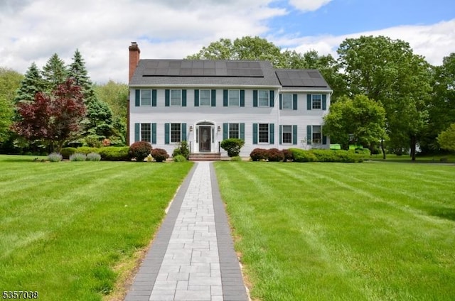16 Dorset Ln, Andover Twp, NJ 07848 - colonial house with solar panels and a front yard