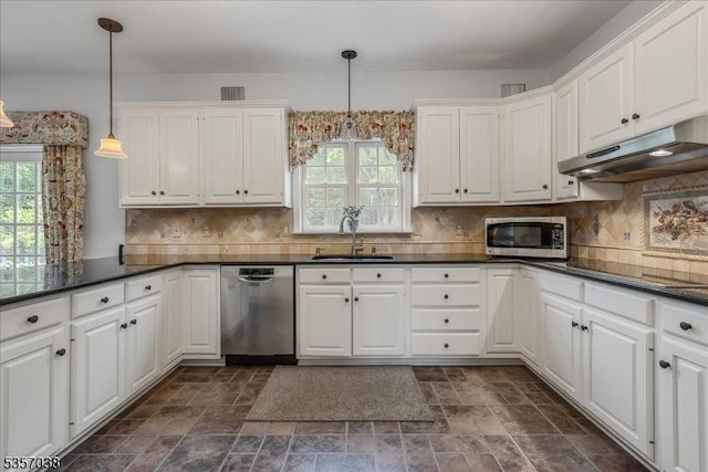 16 Dorset Ln, Andover Twp, NJ 07848 - kitchen with stainless steel appliances, a sink, under cabinet range hood, and dark stone finish floors