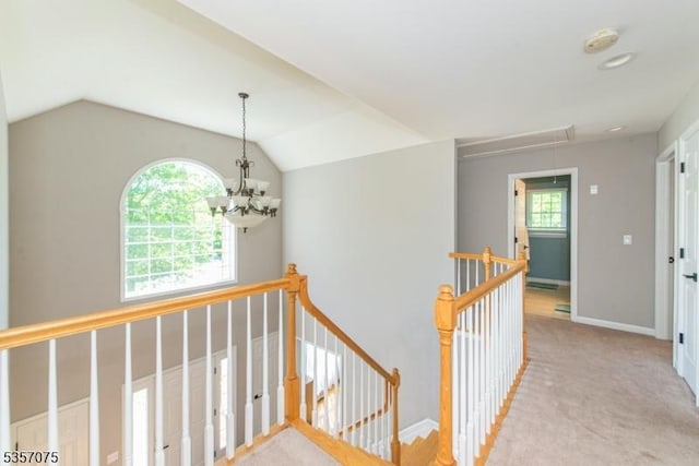 4 Ramsey Ct, Frelinghuysen Twp, NJ 07860 - hall with an upstairs landing, attic access, a chandelier, light carpet, and baseboards
