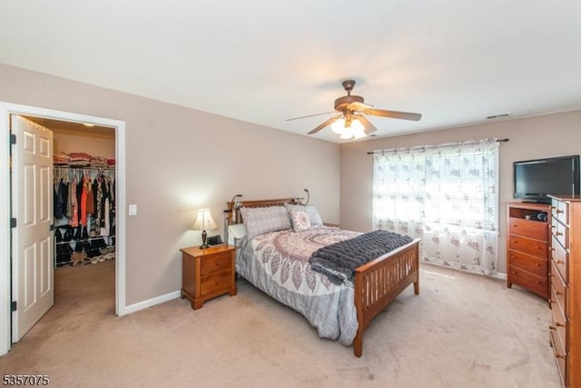 4 Ramsey Ct, Frelinghuysen Twp, NJ 07860 - bedroom featuring light carpet, a walk in closet, a closet, baseboards, and a ceiling fan