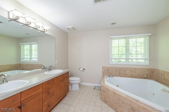 4 Ramsey Ct, Frelinghuysen Twp, NJ 07860 - bathroom featuring a tub with jets, toilet, double vanity, and tile patterned flooring
