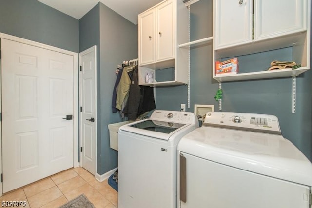 4 Ramsey Ct, Frelinghuysen Twp, NJ 07860 - laundry room with cabinet space, independent washer and dryer, light tile patterned flooring, and baseboards