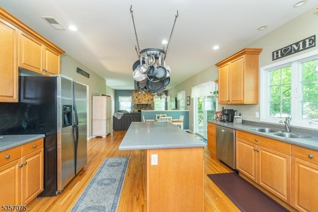 4 Ramsey Ct, Frelinghuysen Twp, NJ 07860 - kitchen with appliances with stainless steel finishes, a sink, a center island, light wood-style floors, and a chandelier