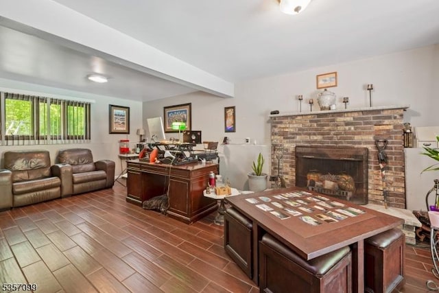79 Lozier Rd, Mount Olive Twp, NJ 07828 - living room with a brick fireplace, dark wood-style floors, and beamed ceiling