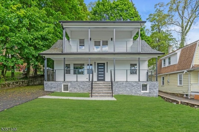 162 Lakeside Blvd, Hopatcong Boro, NJ 07843 - view of front of home featuring covered porch, a balcony, and a front yard
