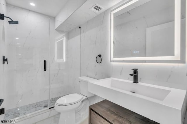 162 Lakeside Blvd, Hopatcong Boro, NJ 07843 - bathroom featuring toilet, a marble finish shower, vanity, and marble look tiles