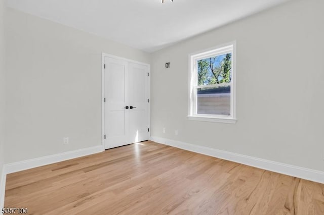 162 Lakeside Blvd, Hopatcong Boro, NJ 07843 - spare room featuring baseboards and light wood-style floors