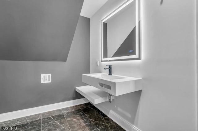 162 Lakeside Blvd, Hopatcong Boro, NJ 07843 - bathroom with baseboards and marble finish floors