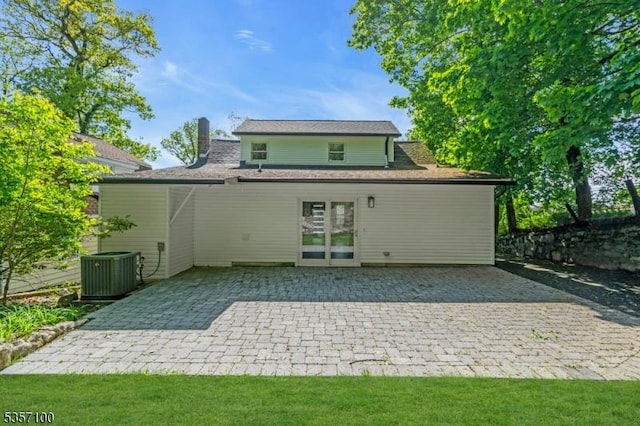 162 Lakeside Blvd, Hopatcong Boro, NJ 07843 - back of house featuring a patio area, central air condition unit, and a chimney