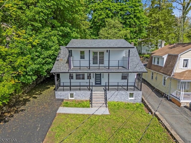 162 Lakeside Blvd, Hopatcong Boro, NJ 07843 - view of front of home featuring a balcony, stairs, a front yard, and asphalt driveway