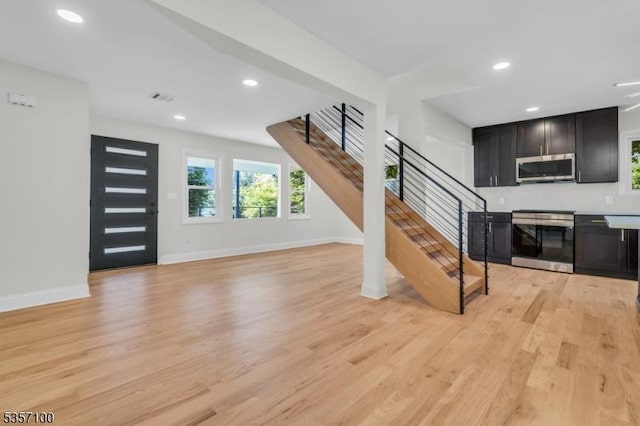 162 Lakeside Blvd, Hopatcong Boro, NJ 07843 - unfurnished living room with stairway, light wood-style floors, recessed lighting, and baseboards