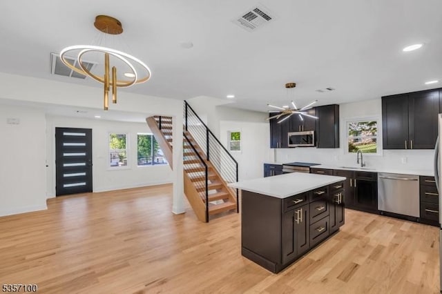 162 Lakeside Blvd, Hopatcong Boro, NJ 07843 - kitchen featuring appliances with stainless steel finishes, a sink, a chandelier, light wood-type flooring, and recessed lighting