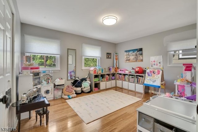 playroom with wood finished floors