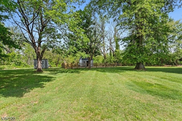12 Glory Rd, Clinton Twp, NJ 08833 - view of yard featuring a storage unit and an outdoor structure