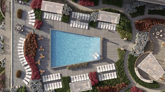 drone / aerial view of a pool area