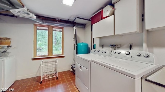 15 Pschorn Ln, Hillsborough Twp, NJ 08844 - laundry area featuring separate washer and dryer, cabinet space, and tile patterned floors