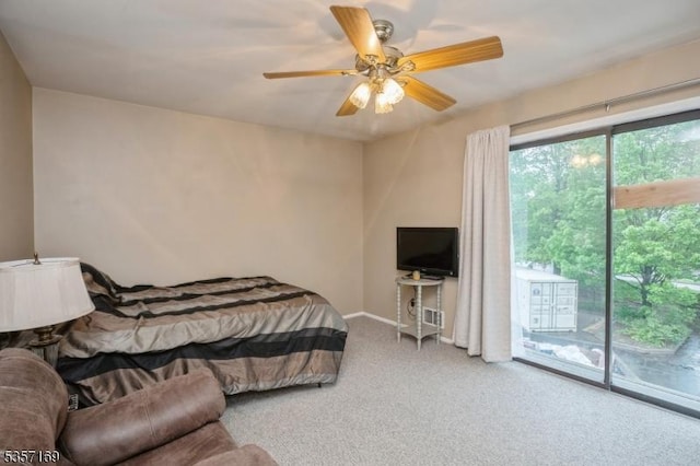 bedroom featuring access to exterior, carpet, ceiling fan, and baseboards