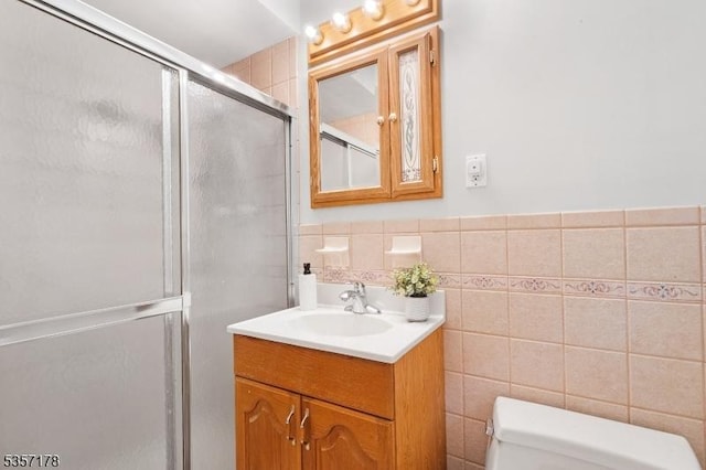 642 Succasunna Rd, Mount Arlington Boro, NJ 07850 - bathroom featuring tile walls, a stall shower, toilet, and vanity
