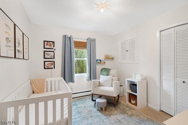 642 Succasunna Rd, Mount Arlington Boro, NJ 07850 - bedroom with a baseboard heating unit and a closet