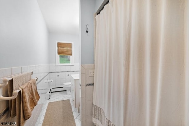 642 Succasunna Rd, Mount Arlington Boro, NJ 07850 - bathroom featuring tile walls, tile patterned floors, wainscoting, toilet, and curtained shower