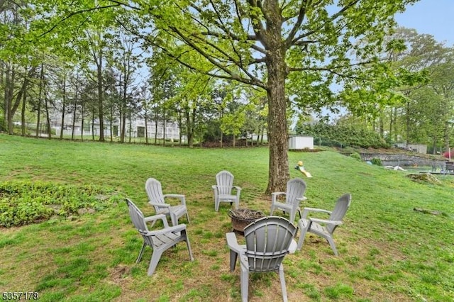 642 Succasunna Rd, Mount Arlington Boro, NJ 07850 - view of grassy yard featuring an outdoor fire pit