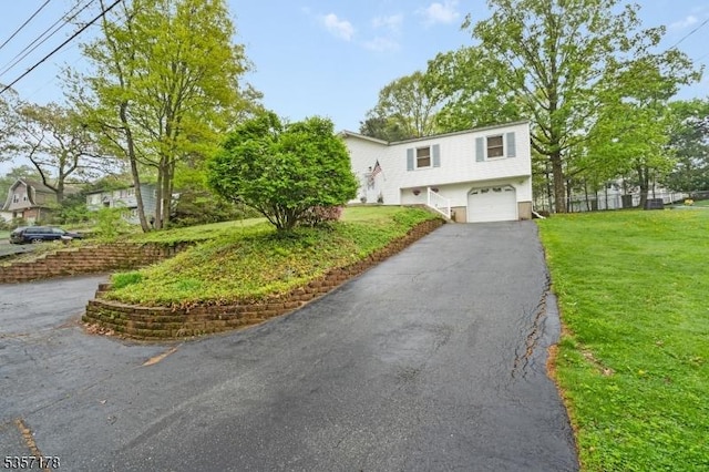 642 Succasunna Rd, Mount Arlington Boro, NJ 07850 - view of front facade featuring an attached garage, driveway, and a front lawn