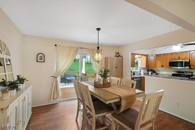 642 Succasunna Rd, Mount Arlington Boro, NJ 07850 - dining space featuring dark wood-style flooring and baseboards